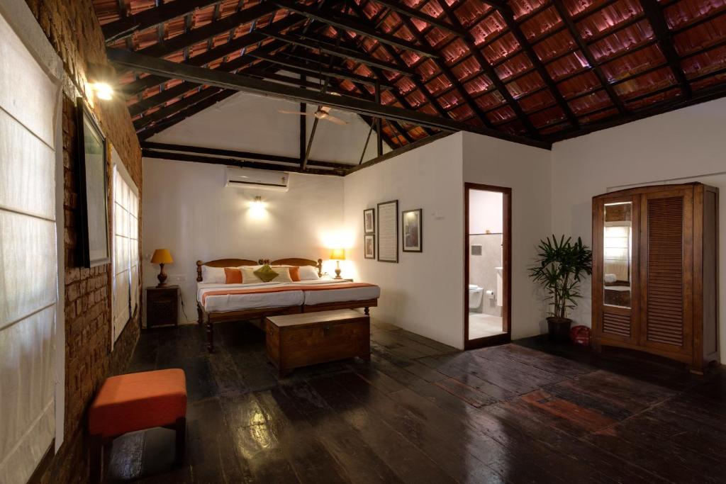 Postel nebo postele na pokoji v ubytování Niyati - Boutique Stay