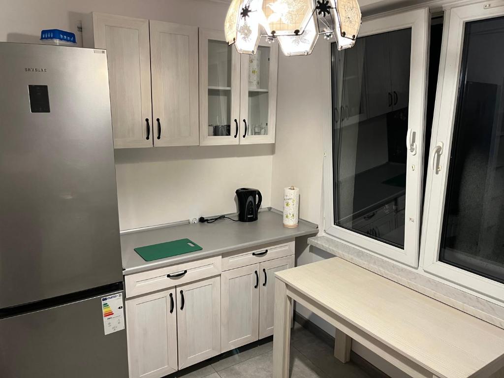 Kuchyňa alebo kuchynka v ubytovaní Apartament 75 w Centrum! Okulickiego!
