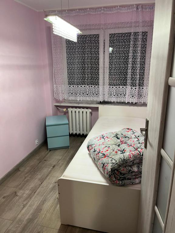 Posteľ alebo postele v izbe v ubytovaní Apartament 75 w Centrum! Okulickiego!