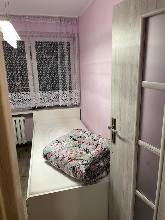 Posteľ alebo postele v izbe v ubytovaní Apartament 75 w Centrum! Okulickiego!