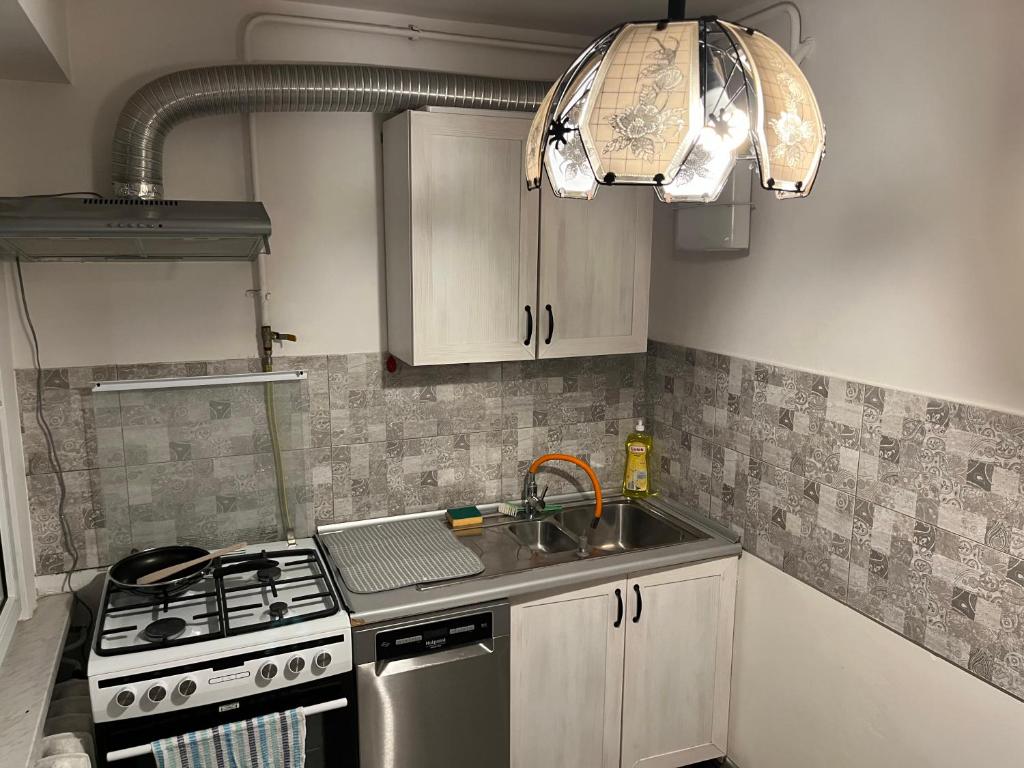 Kuchyňa alebo kuchynka v ubytovaní Apartament 75 w Centrum! Okulickiego!