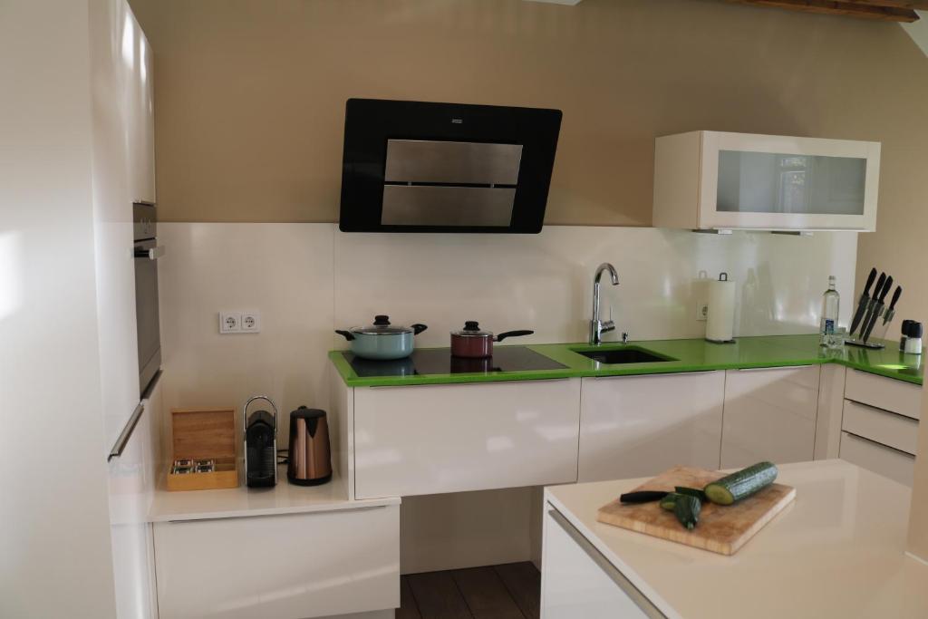 Kuchyň nebo kuchyňský kout v ubytování Wohnung bei Façon