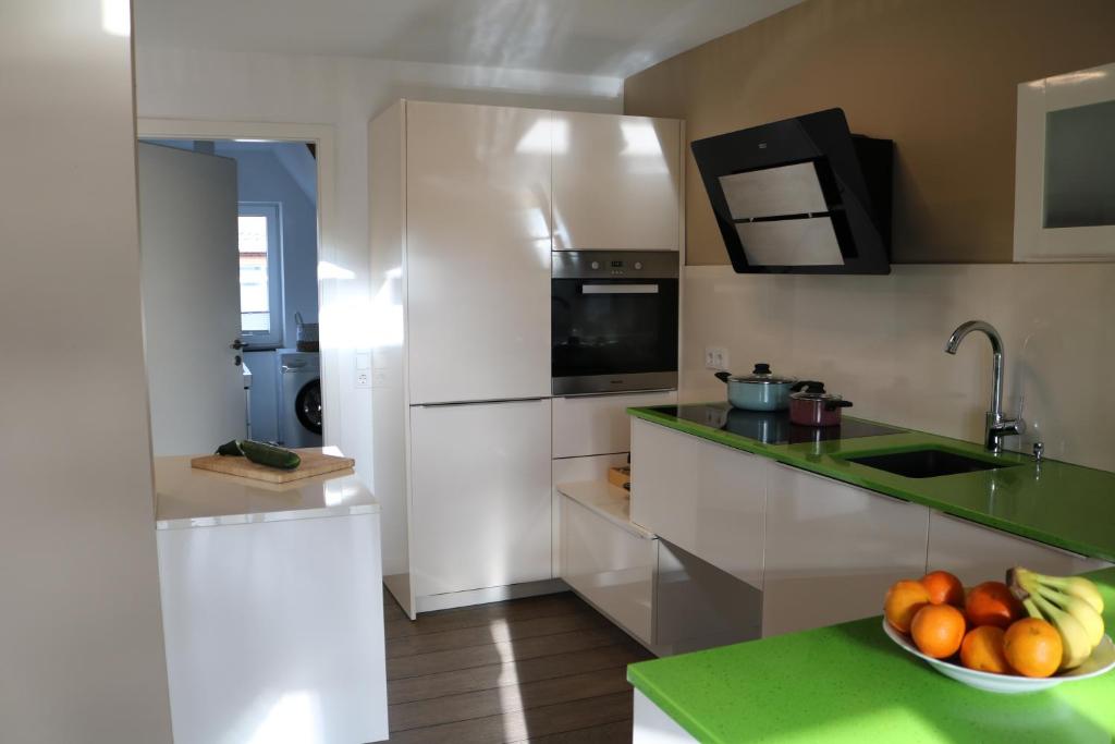 Kuchyň nebo kuchyňský kout v ubytování Wohnung bei Façon