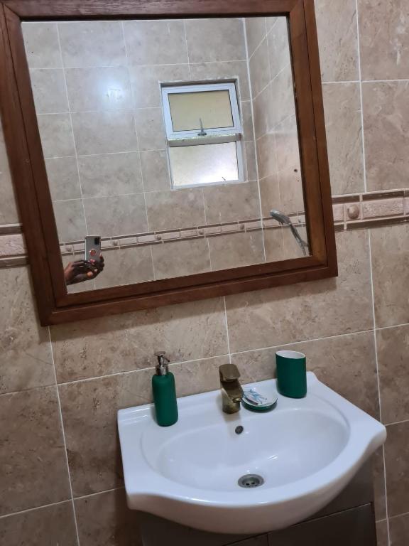 Koupelna v ubytování Karibuni palace mtwapa