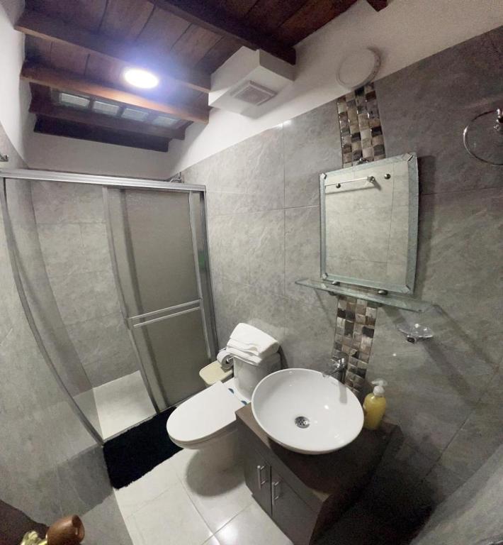Koupelna v ubytování Agradable casa en Buga junto a la basílica