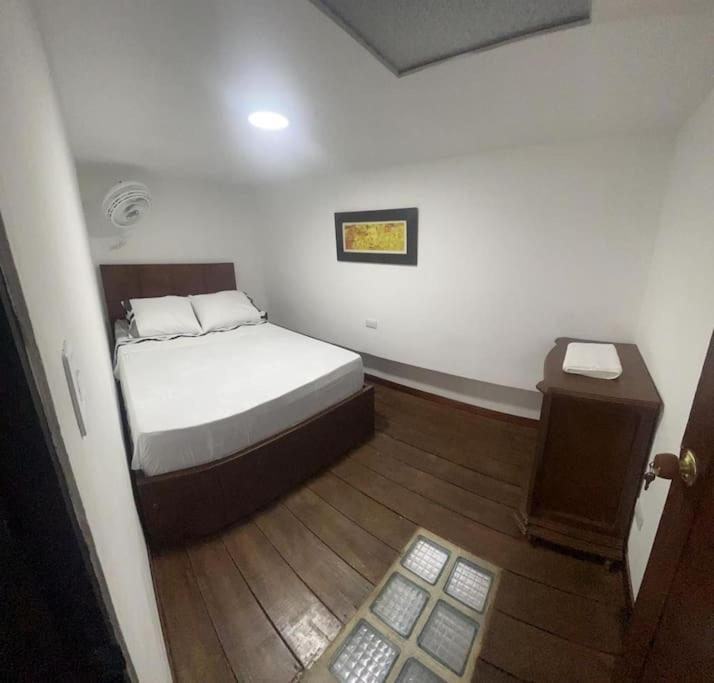 Postel nebo postele na pokoji v ubytování Agradable casa en Buga junto a la basílica
