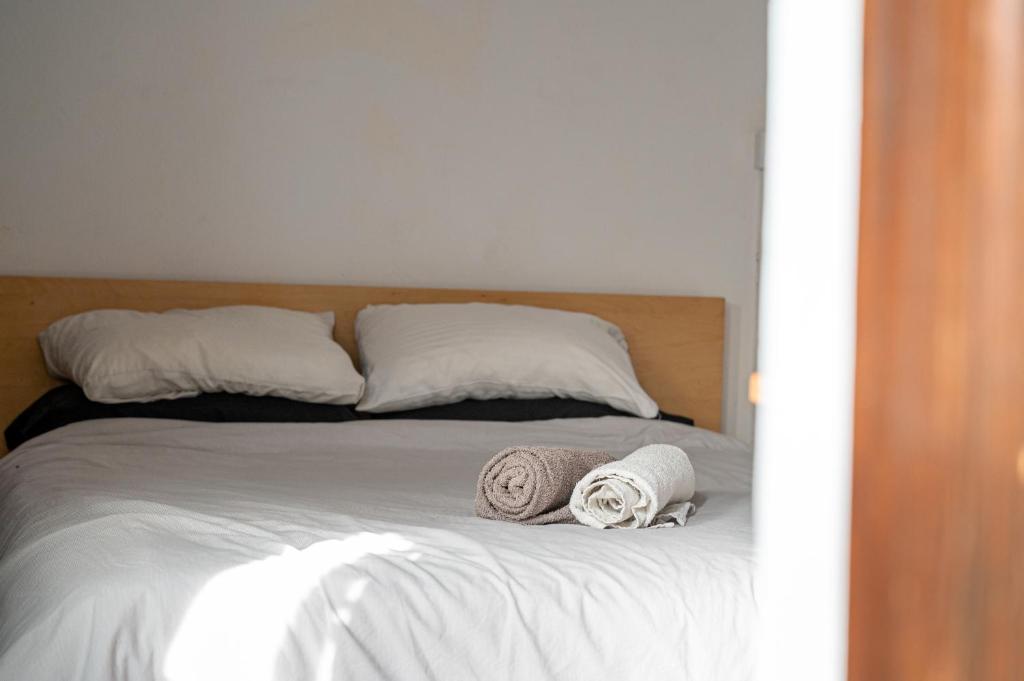 Postel nebo postele na pokoji v ubytování Drago Hostel