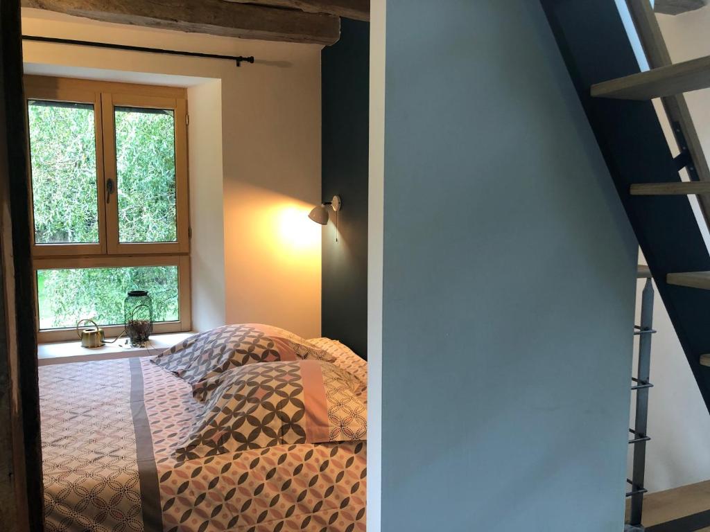 Posteľ alebo postele v izbe v ubytovaní Gîte de caractère à la campagne