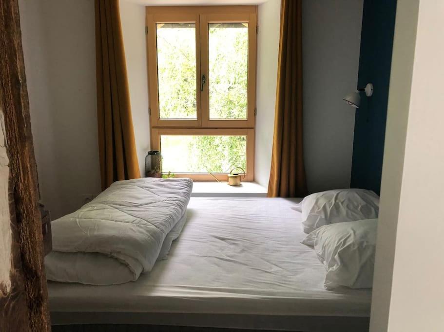 Posteľ alebo postele v izbe v ubytovaní Gîte de caractère à la campagne