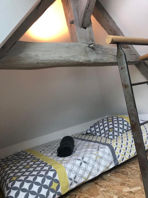 Posteľ alebo postele v izbe v ubytovaní Gîte de caractère à la campagne