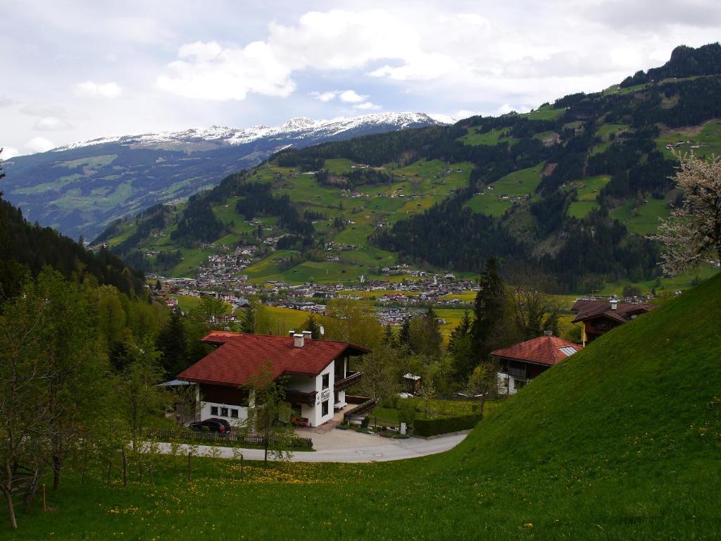a view of a town in a valley with mountains at Haus Klammtal in Schwendau