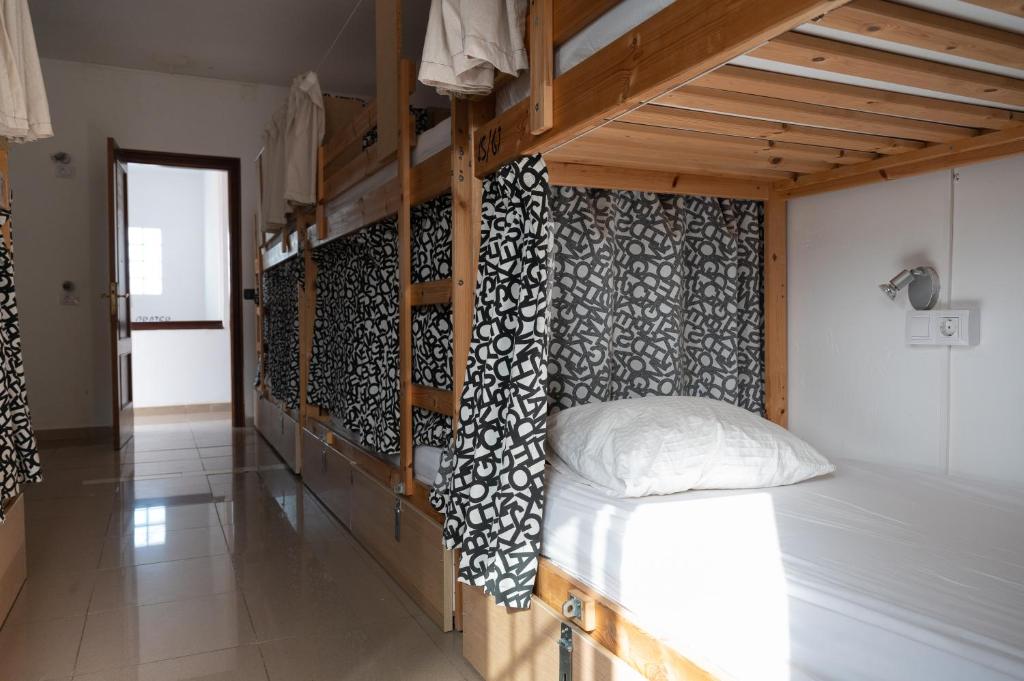 Postel nebo postele na pokoji v ubytování Drago Hostel