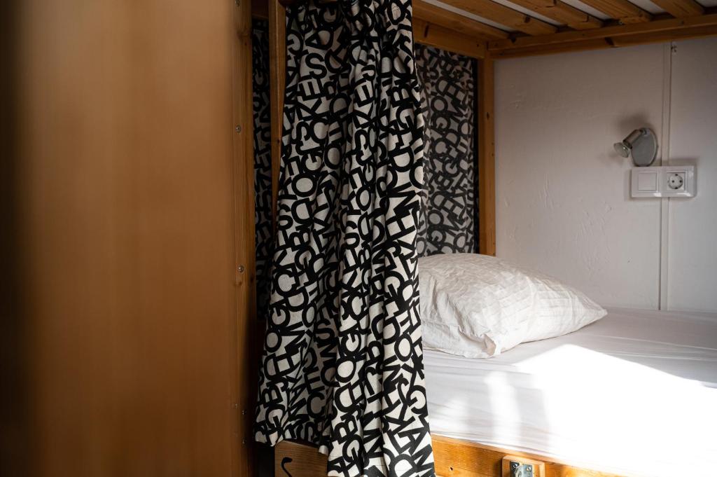 Postel nebo postele na pokoji v ubytování Drago Hostel