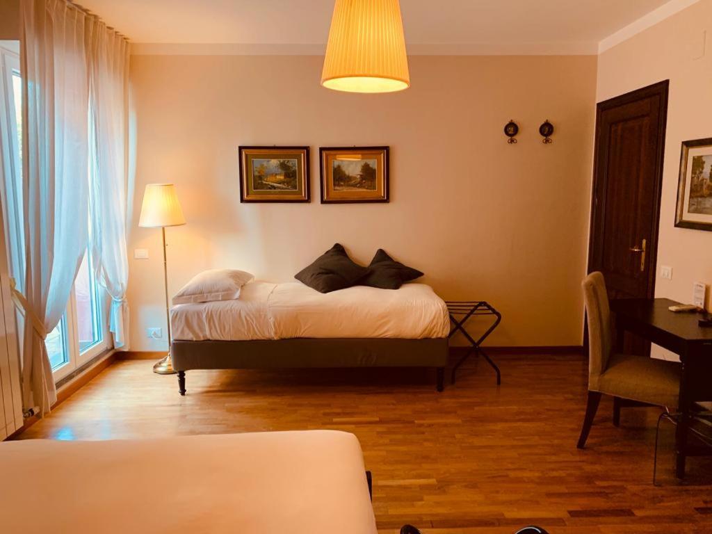 Postel nebo postele na pokoji v ubytování Casa Ciampi Locazione Turistica