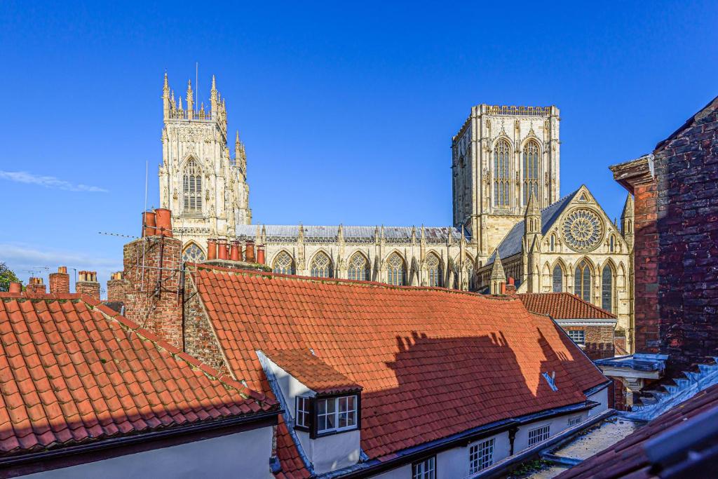 a view of a cathedral with a red roof at 37a Stonegate Loft in York
