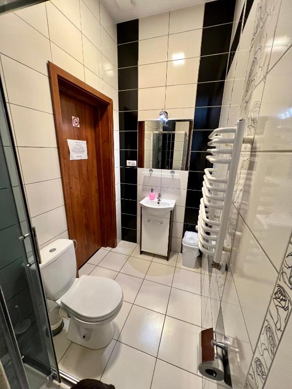 Kúpeľňa v ubytovaní Apartamenty Ostrowiec - Pokoje Gościnne Centrum