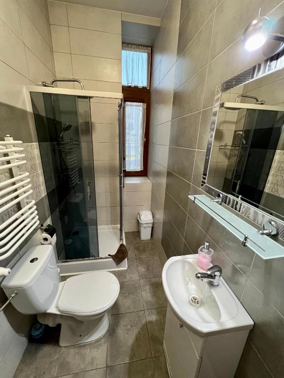 Kúpeľňa v ubytovaní Apartamenty Ostrowiec - Pokoje Gościnne Centrum