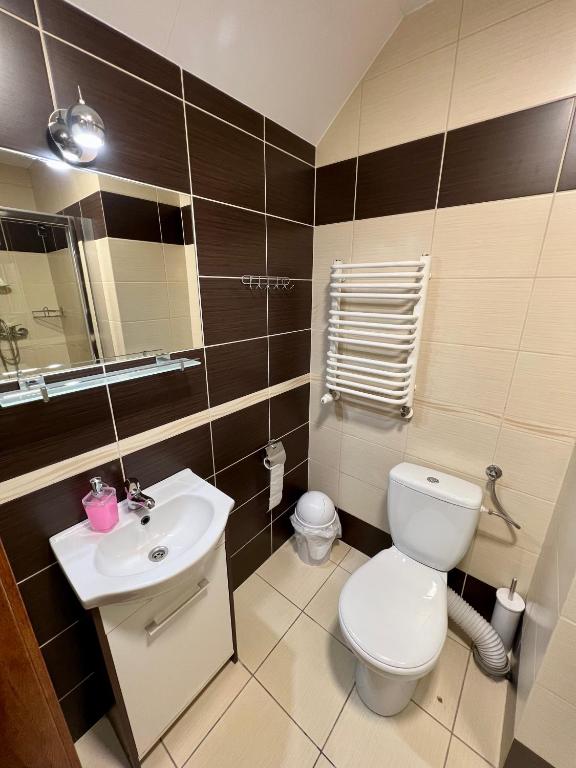 Kúpeľňa v ubytovaní Apartamenty Ostrowiec - Pokoje Gościnne Centrum