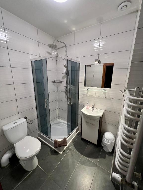 Kúpeľňa v ubytovaní Apartamenty Ostrowiec - Pokoje Gościnne Centrum