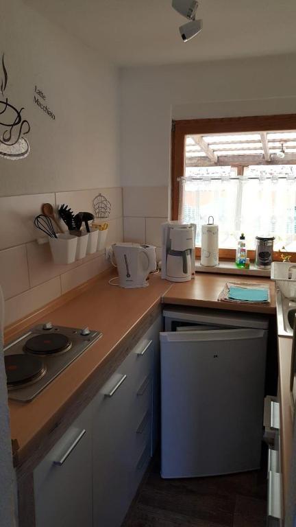 Kuchyň nebo kuchyňský kout v ubytování Bungalow