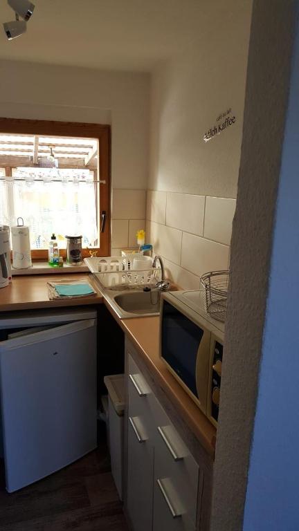 Kuchyň nebo kuchyňský kout v ubytování Bungalow