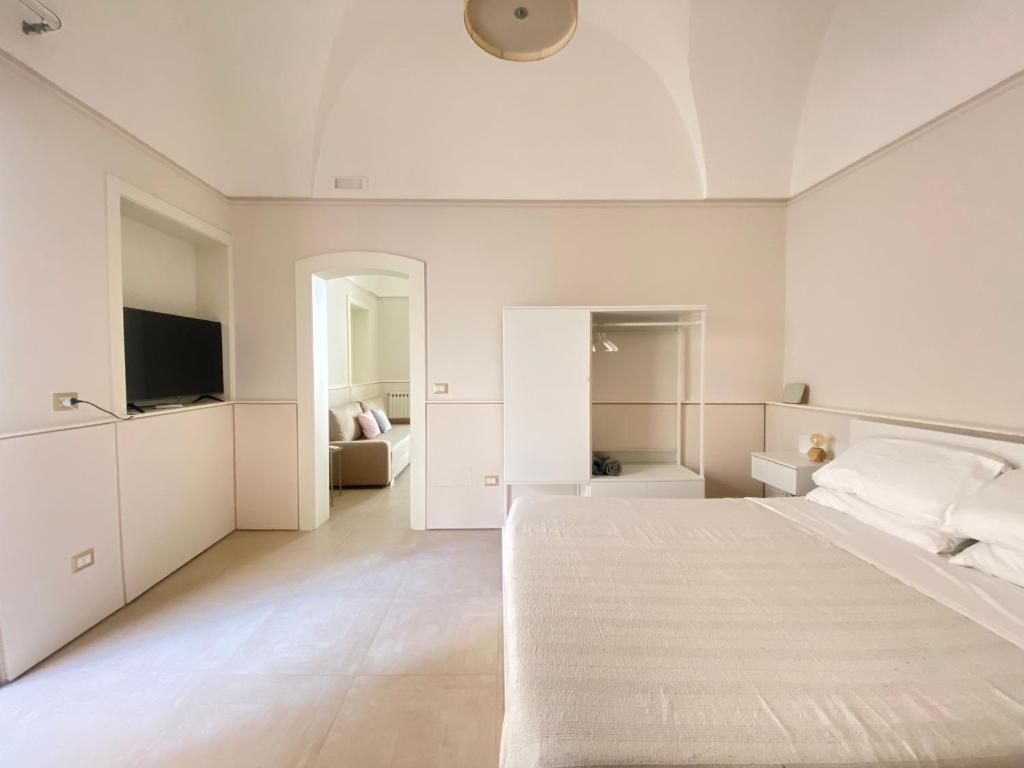Posteľ alebo postele v izbe v ubytovaní Bottego24 Suite, Apartment & Terrace