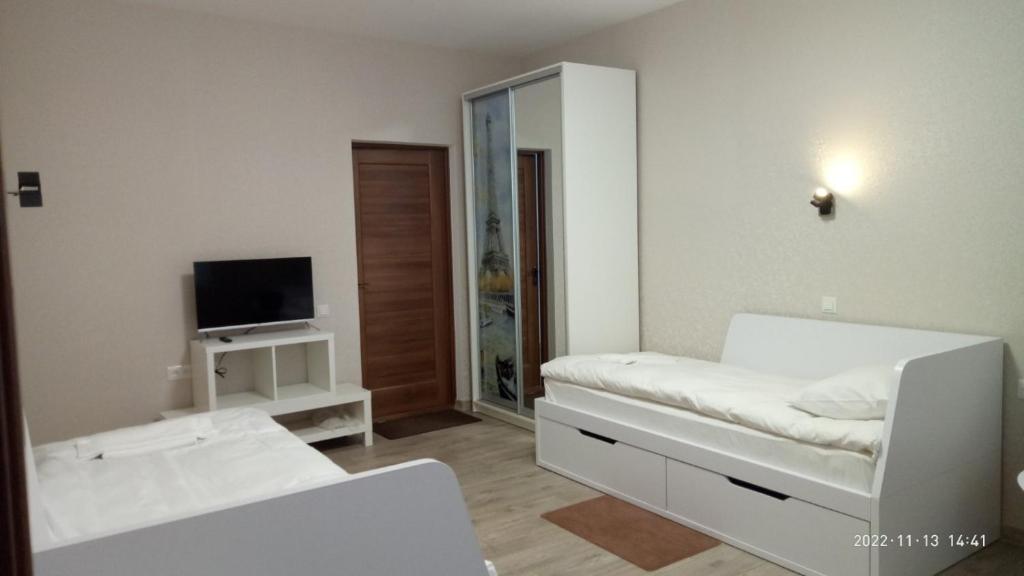 Postel nebo postele na pokoji v ubytování Hotel Avatar
