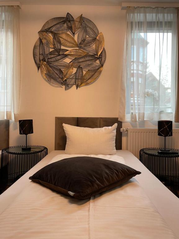 Postel nebo postele na pokoji v ubytování A&C Hotel
