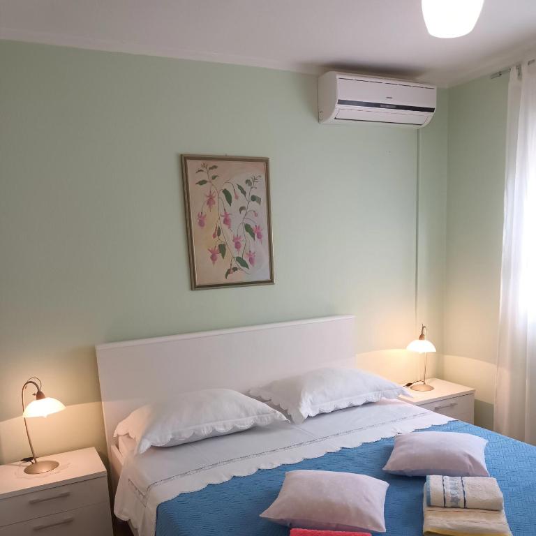 Postel nebo postele na pokoji v ubytování 2B Apartment
