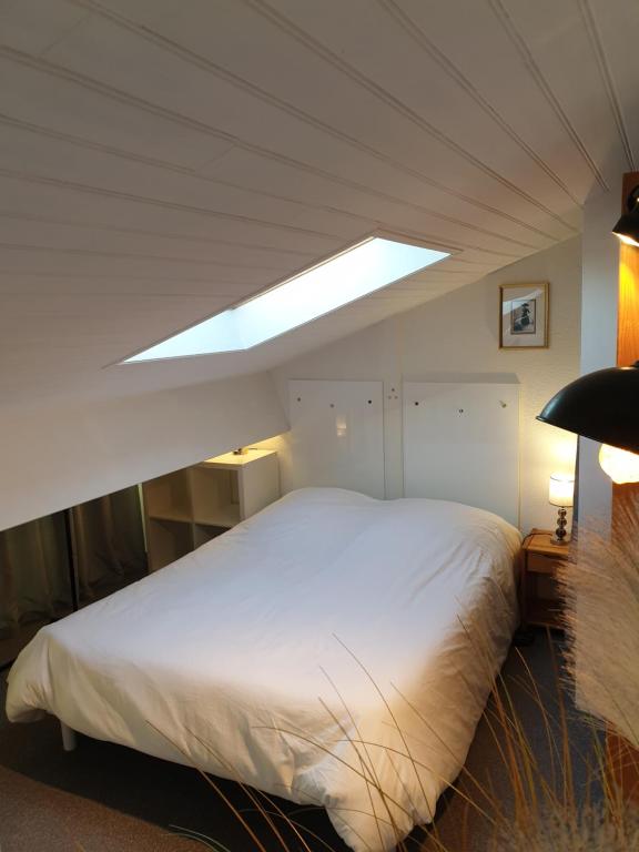 Postel nebo postele na pokoji v ubytování Puytraud Mer