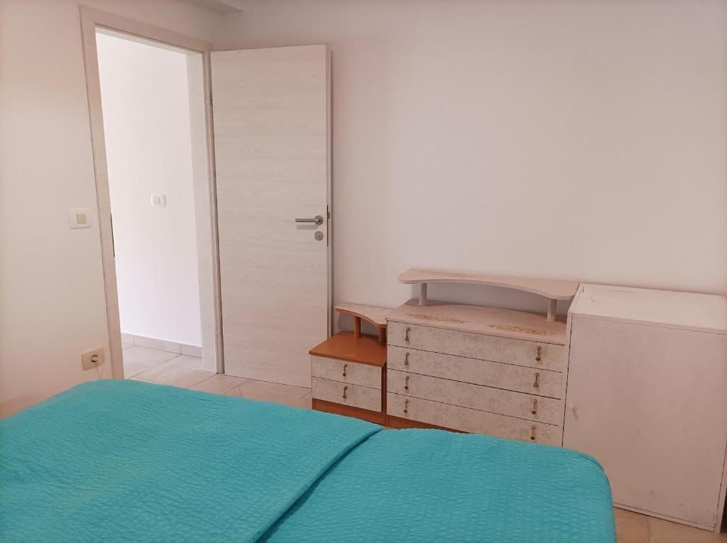 Postel nebo postele na pokoji v ubytování OASIS