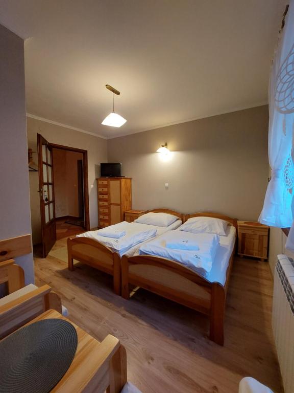 Posteľ alebo postele v izbe v ubytovaní Willa Przekop