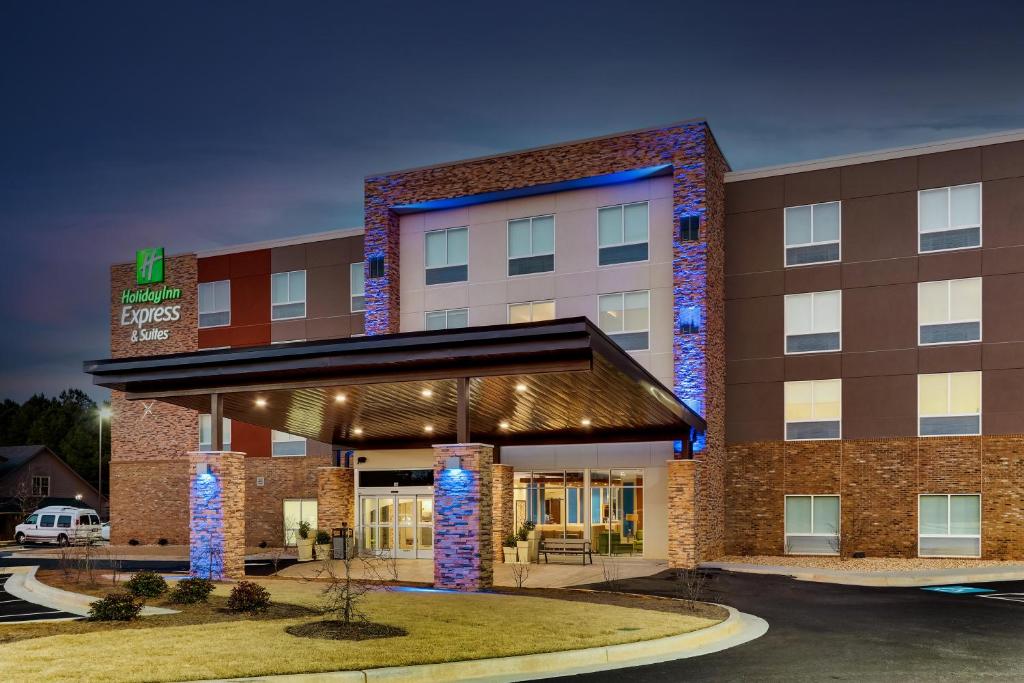 a rendering of a hotel building with a lobby at Holiday Inn Express & Suites - Dawsonville, an IHG Hotel in Dawsonville