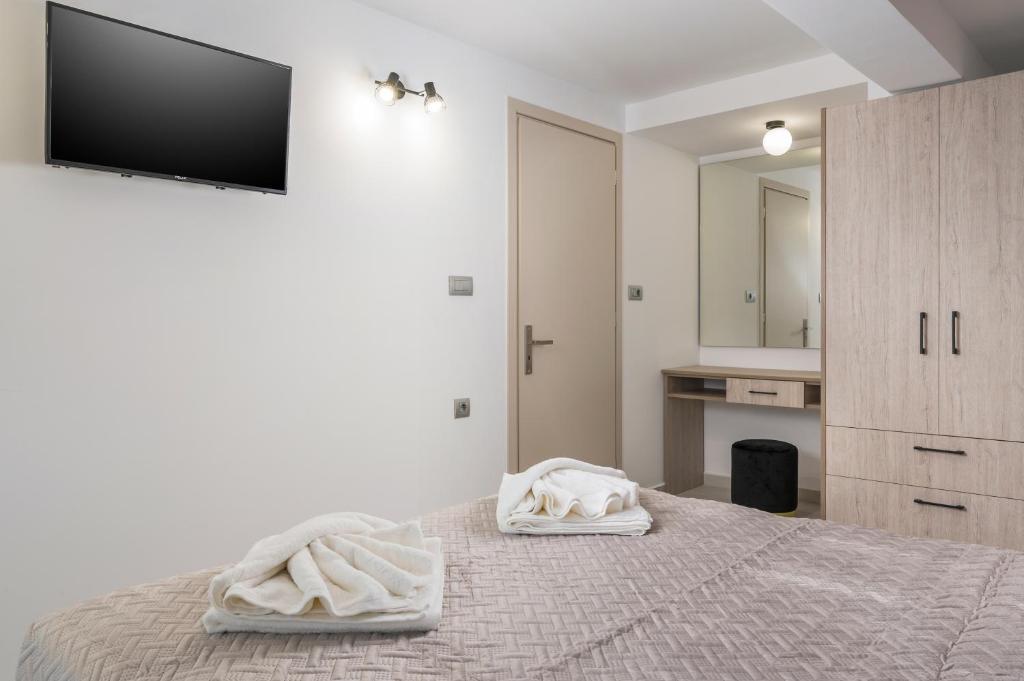 Postel nebo postele na pokoji v ubytování Quarters Luxury Apts