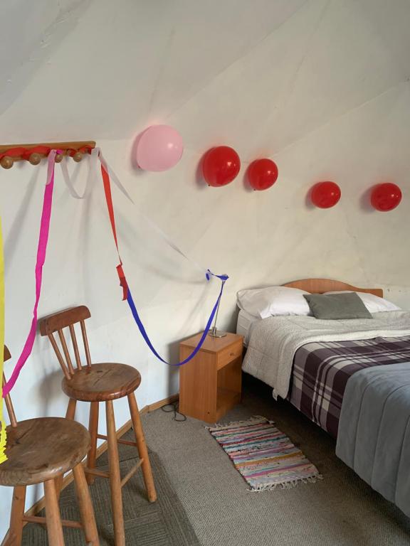 Postel nebo postele na pokoji v ubytování Cabaña El Ingenio