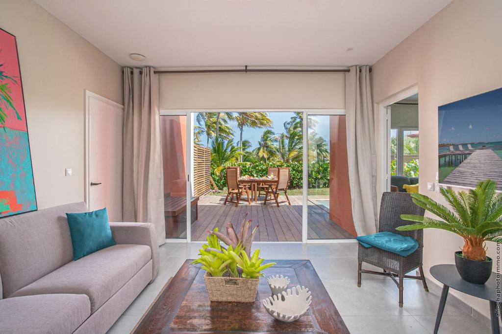 Posezení v ubytování Villa Maorie 1 chambre avec piscine privée