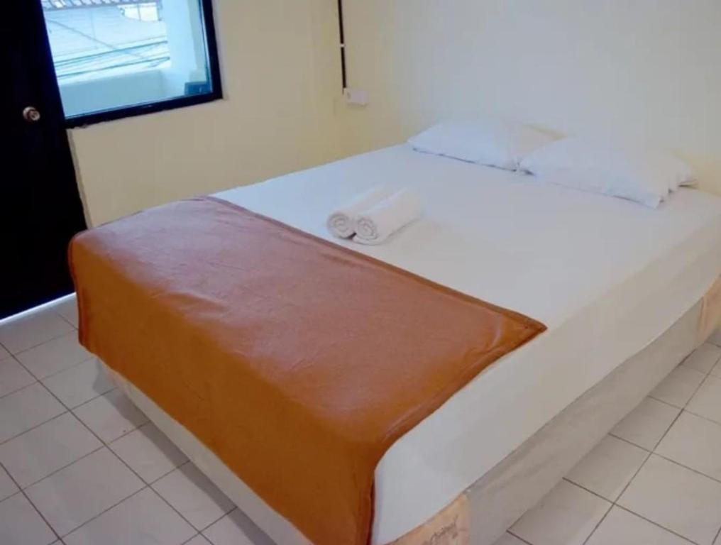 Postel nebo postele na pokoji v ubytování Tab Hotel Legian Bali