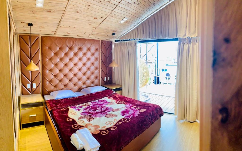 Giường trong phòng chung tại Ngọc Nguyên Homestay