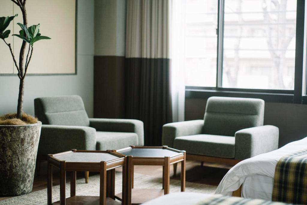 Posezení v ubytování HOTEL Inc