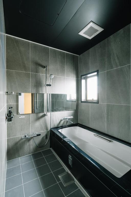 Koupelna v ubytování HOTEL Inc