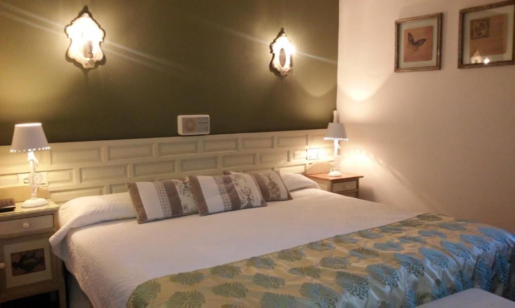 Postel nebo postele na pokoji v ubytování Hotel Boutique Balaitus