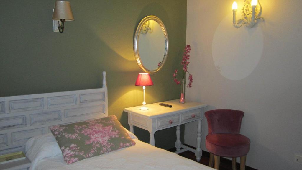 Postel nebo postele na pokoji v ubytování Hotel Boutique Balaitus
