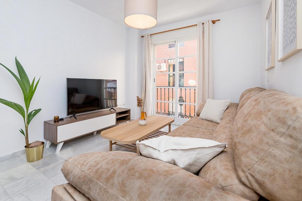 A television and/or entertainment centre at San Rafael City Center Apartment