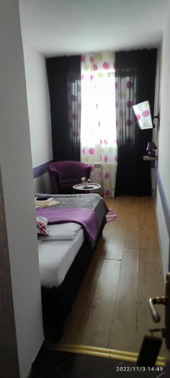 Postel nebo postele na pokoji v ubytování Bed and Breakfast M Jasmin
