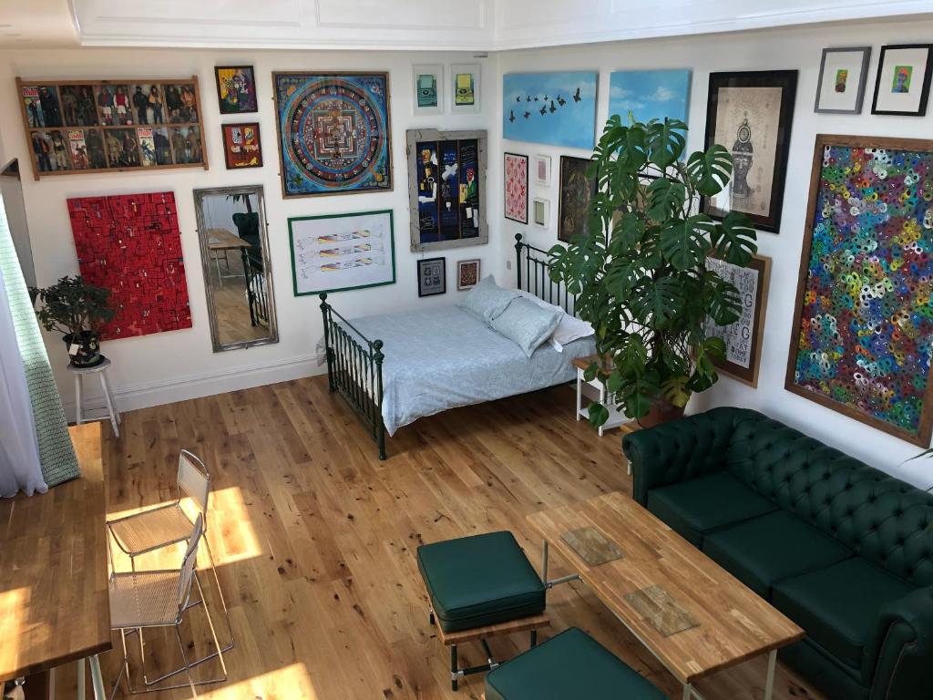 a living room with a couch and a table at The Beetroot in Margate