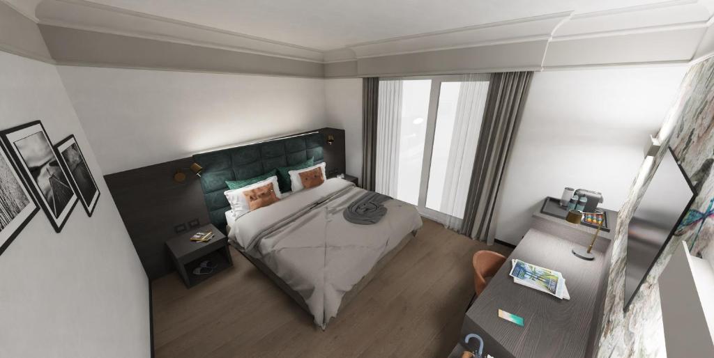 Posteľ alebo postele v izbe v ubytovaní Park Hotel Junior