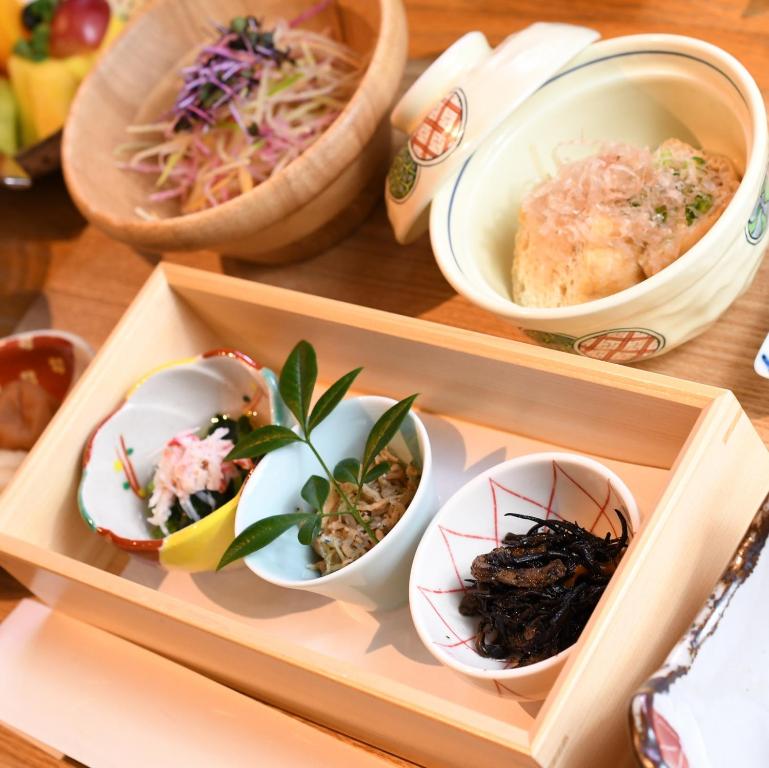a group of bowls of food on a table at Hakone Gora Byakudan in Hakone
