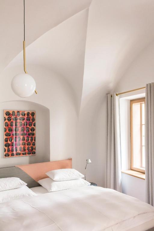 Posteľ alebo postele v izbe v ubytovaní Kai 36 - Hotel zwischen Fels und Fluss
