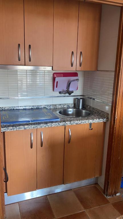 Kuchyň nebo kuchyňský kout v ubytování Rebeca Rooms