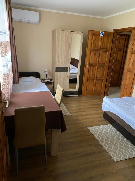 Postel nebo postele na pokoji v ubytování Ókerka Vendégház